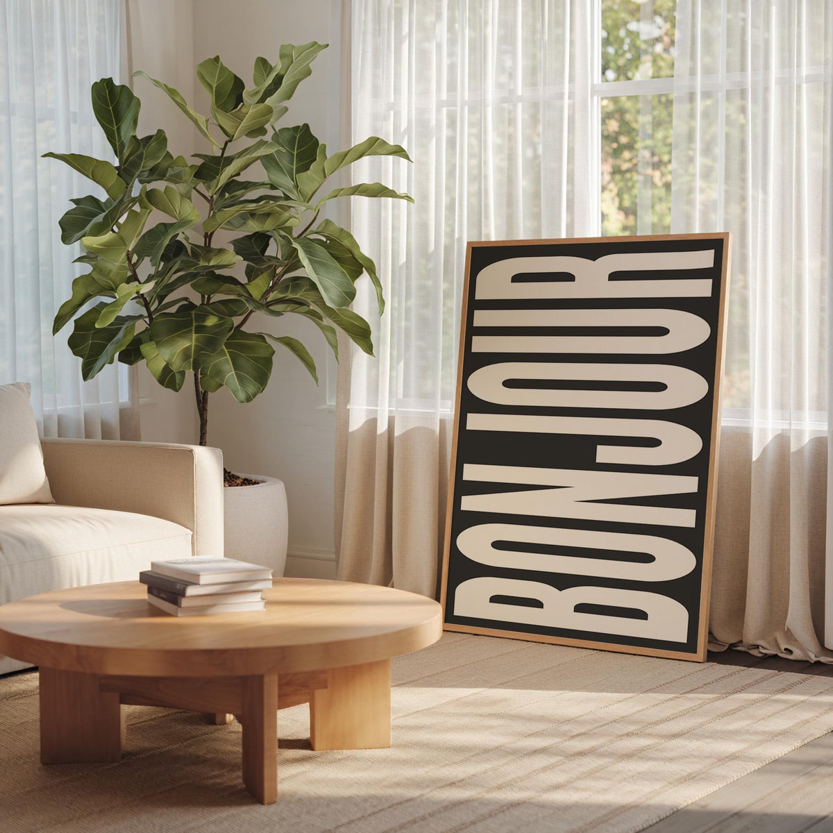 Bonjour print framed in a bright room with a plant