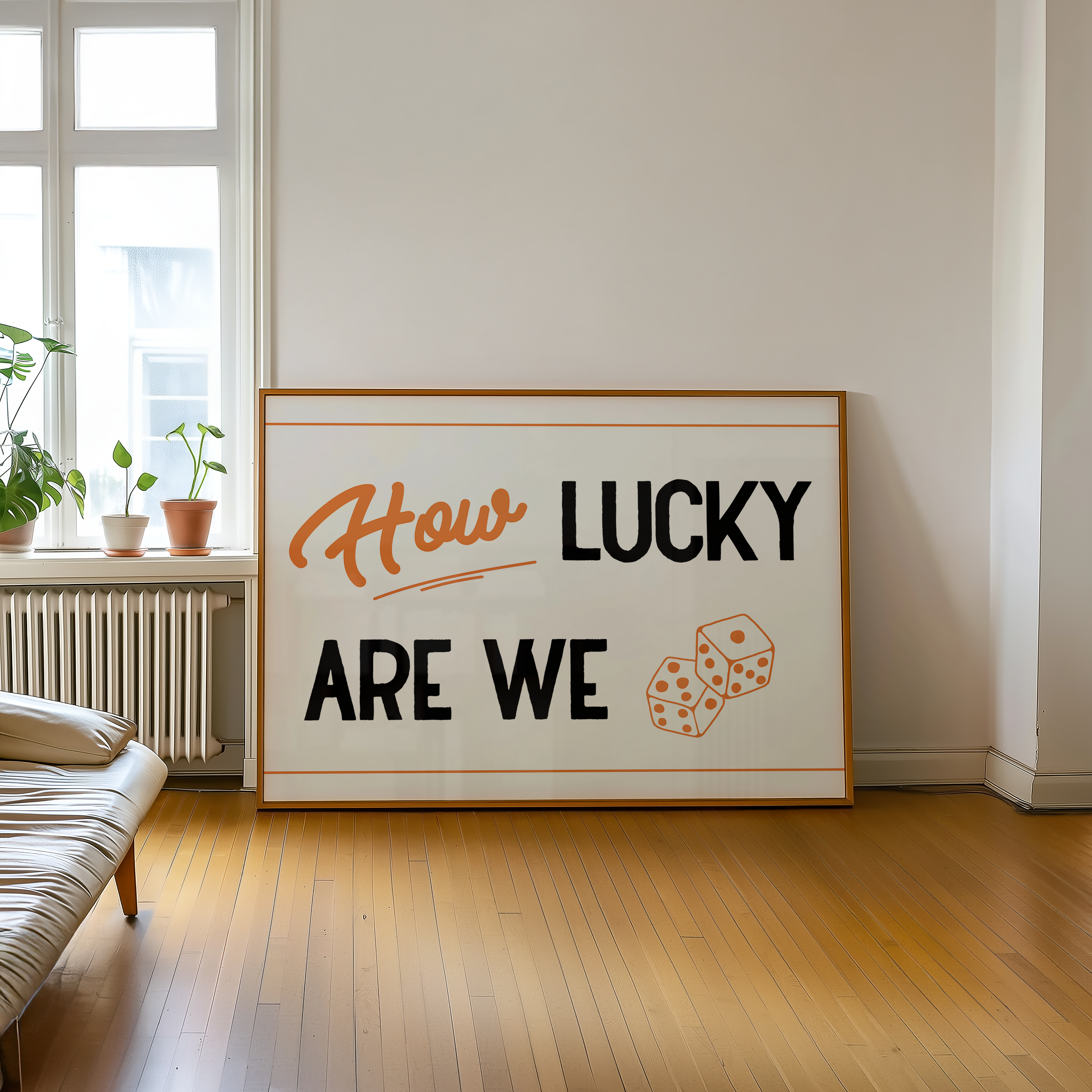 A large framed sign with the text "How LUCKY ARE WE" and two dice graphics is displayed in a room with a window and a plant.