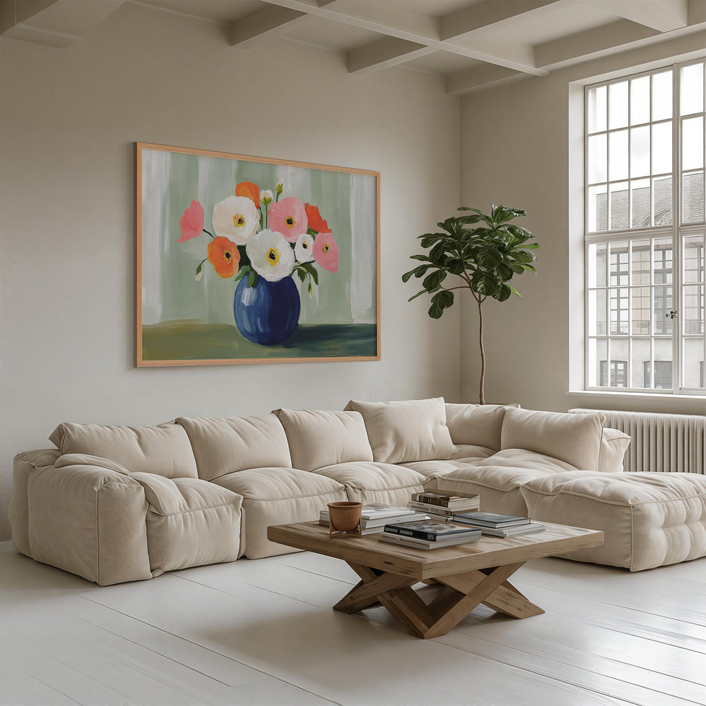 a cozy living room with a large window, a comfortable sofa, a wooden coffee table, and a framed painting of a vase with colorful flowers on the wall.