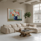 a cozy living room with a large window, a comfortable sofa, a wooden coffee table, and a framed painting of a vase with colorful flowers on the wall.