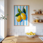a kitchen counter with a bowl of lemons, a framed painting of lemons, and various jars and containers on the shelves.