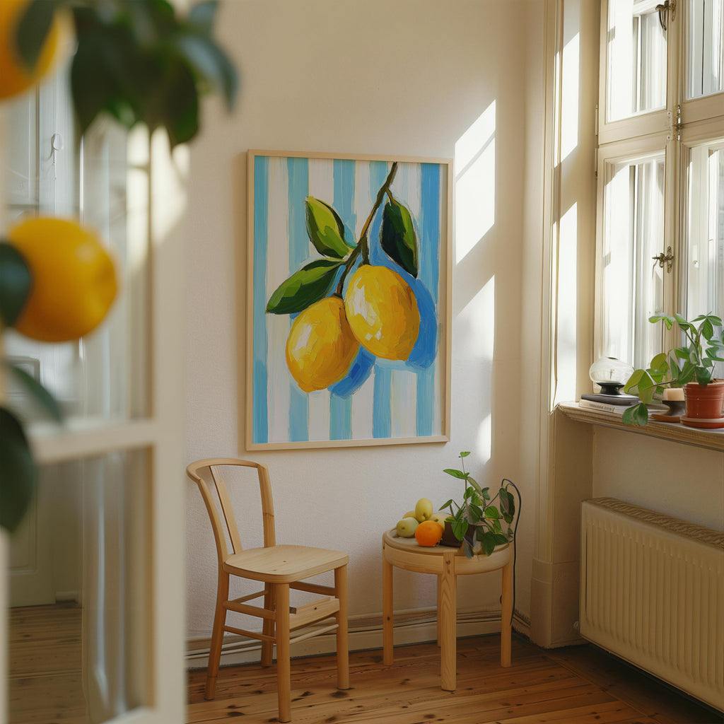 a cozy corner of a room with a wooden chair, a small table with fruit, and a framed painting of lemons hanging on the wall.