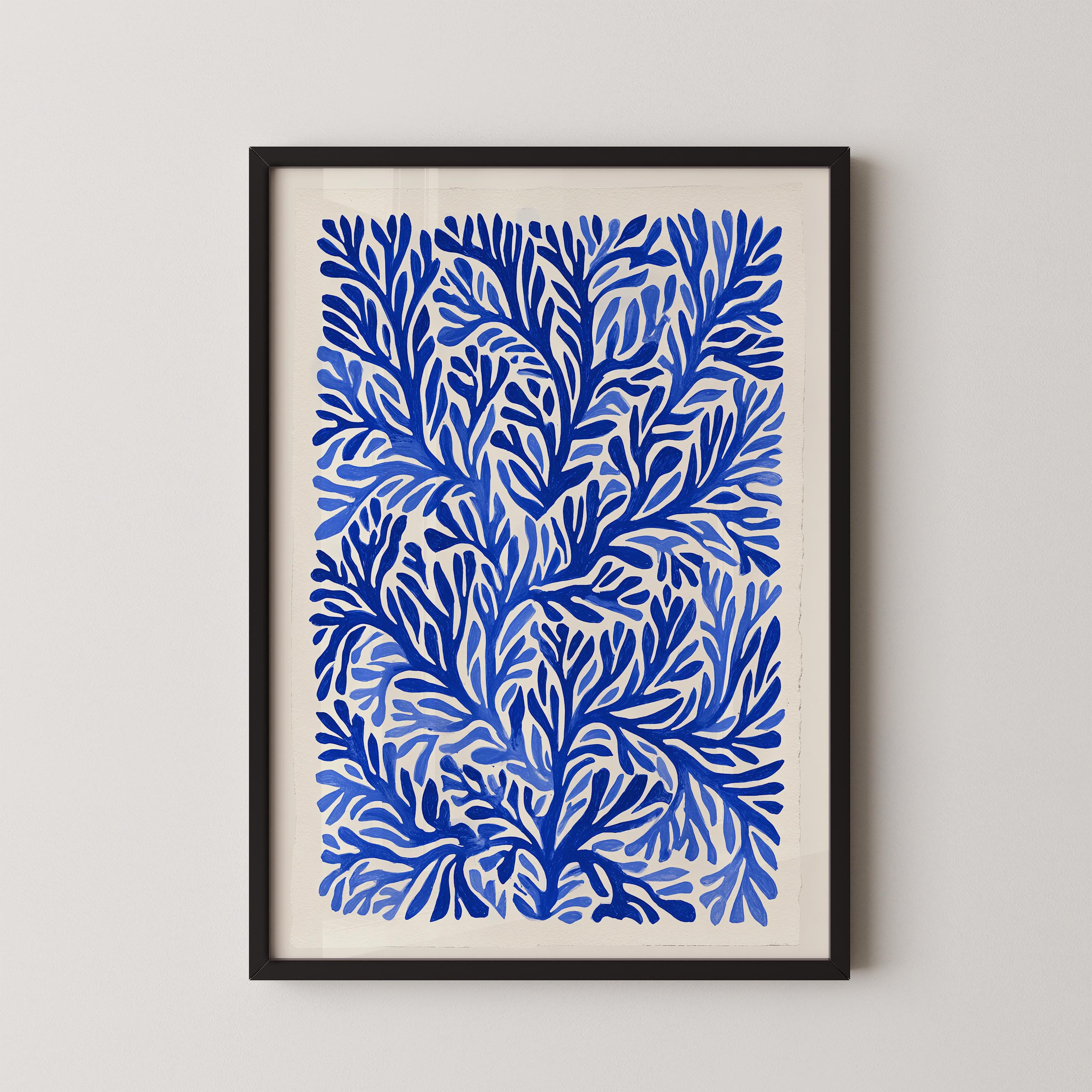 The image is a framed print featuring a repeating pattern of blue and white leaf-like shapes, creating a visually striking and intricate design.