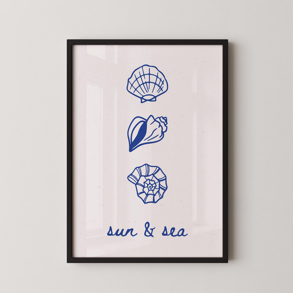 The image is a framed print with three blue illustrations of seashells and a text that reads "sun & sea".