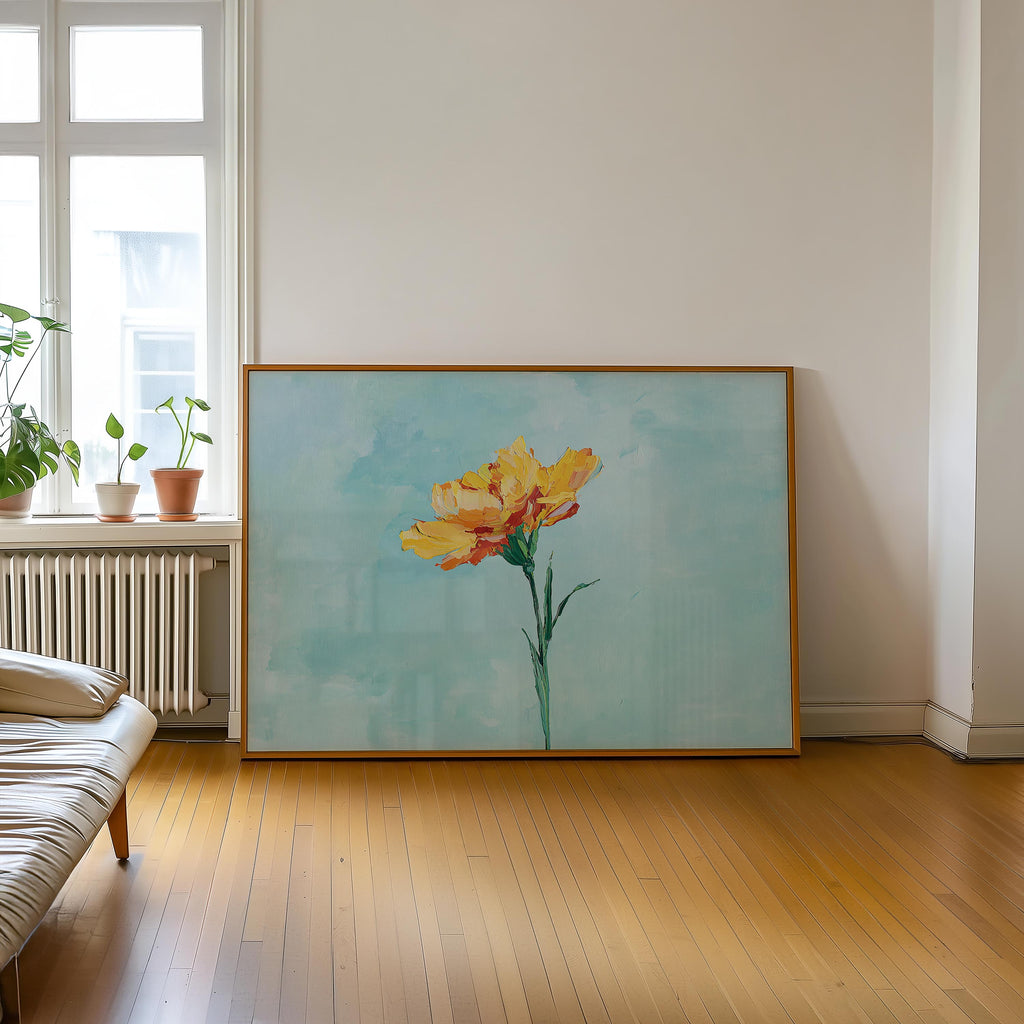 a large painting of a yellow flower on a wooden floor in a room with a window and a radiator.