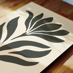 a close-up view of a black and white abstract design on a white background.