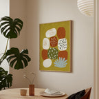 a modern art piece hanging on a wall, with a wooden table and chairs in the foreground. The table has a vase with flowers and a plate, creating a cozy and inviting atmosphere.