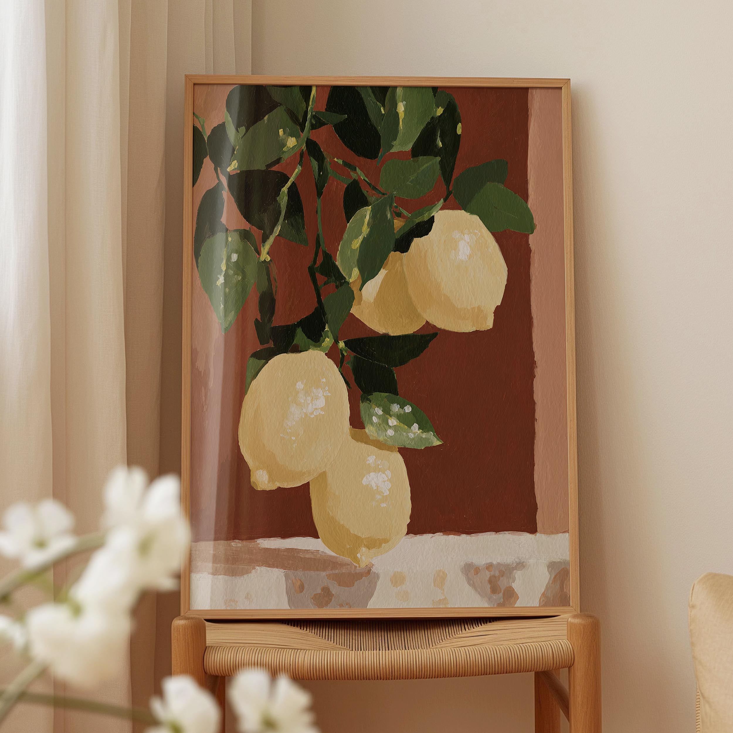 a painting of lemons hanging on a wall, displayed on a wooden frame.