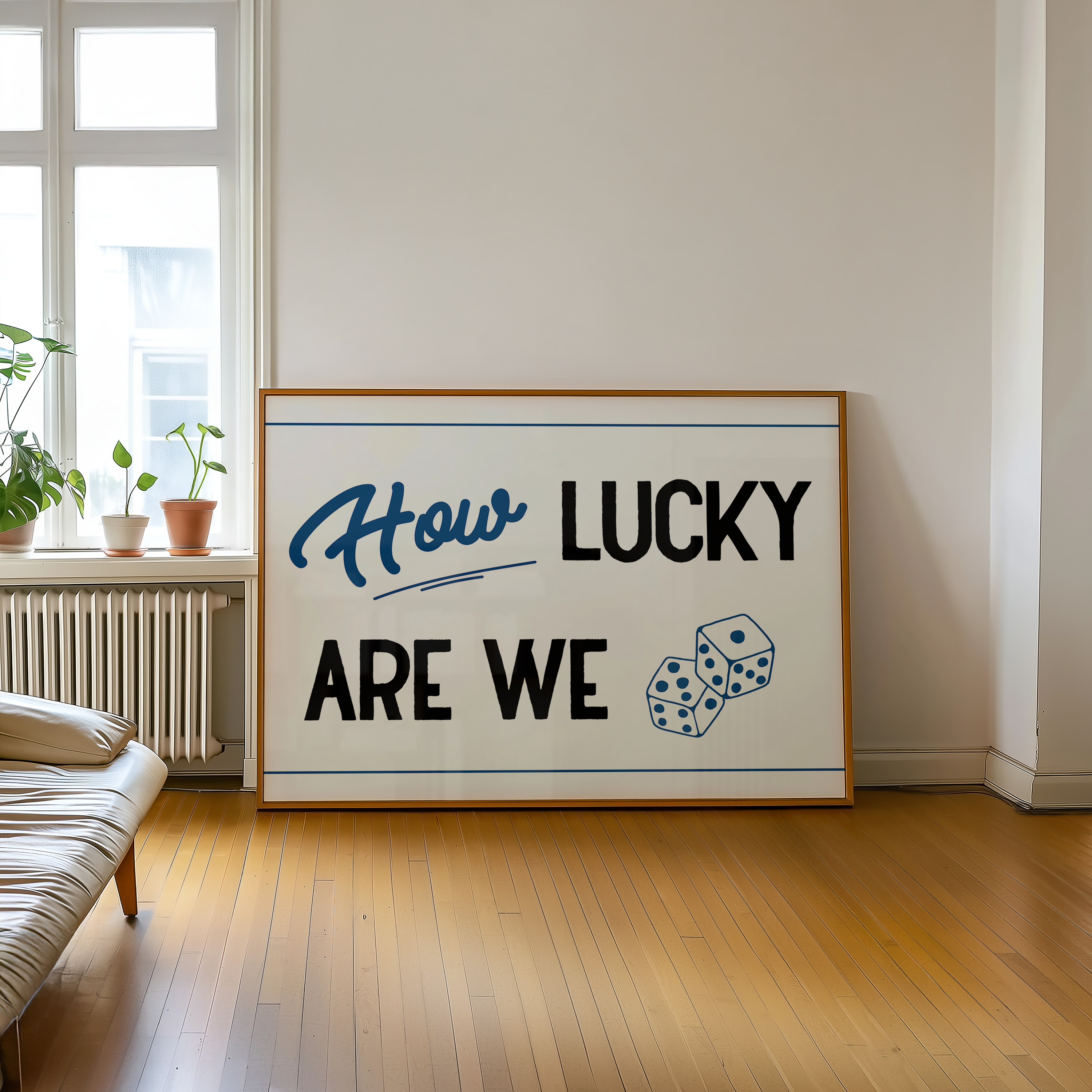 A large framed sign with the text "How LUCKY ARE WE" and two dice graphics is displayed in a room with a window and a plant.