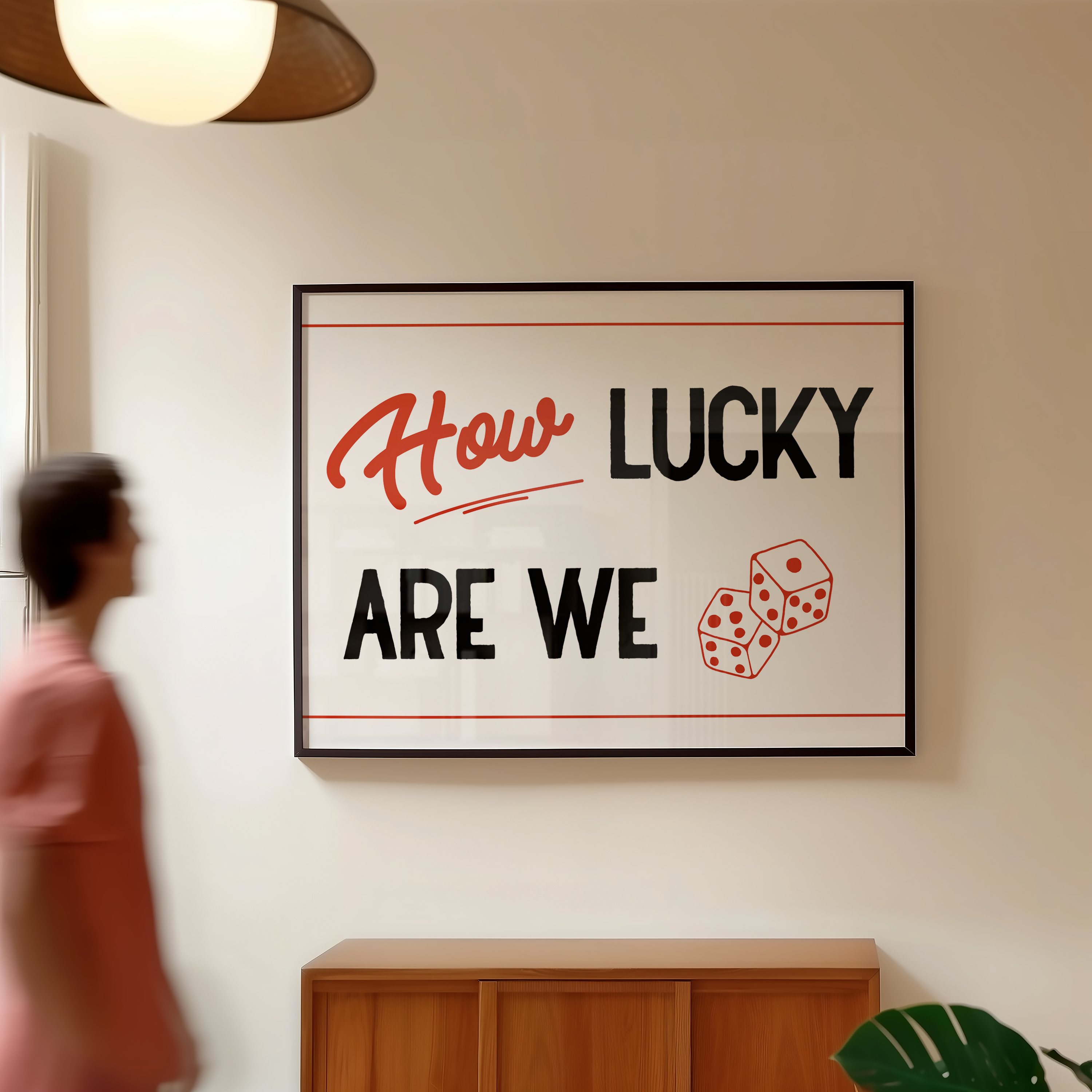 A person is walking past a framed sign that reads "How Lucky Are We" with dice graphics.