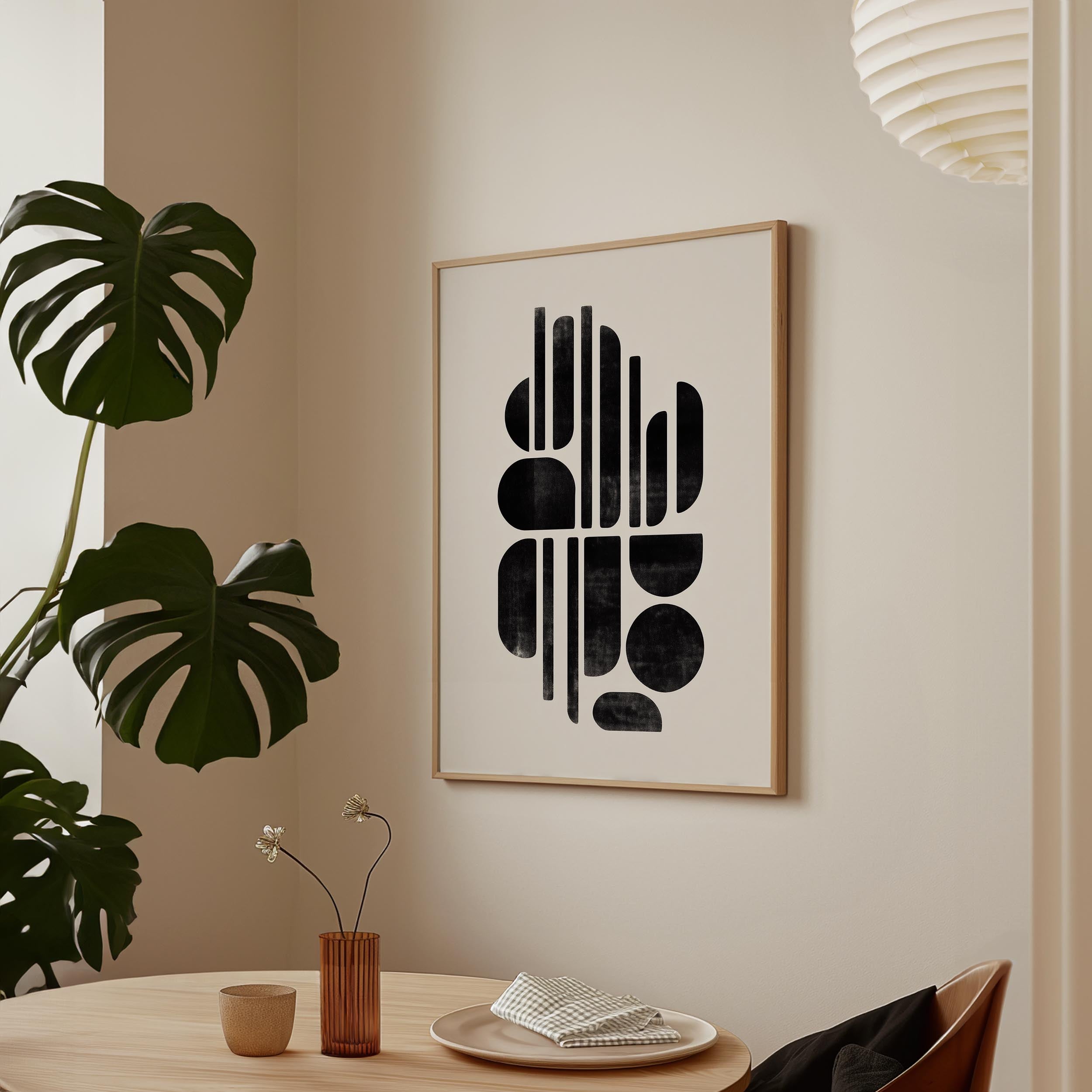a minimalist dining area with a wooden table, a vase with flowers, and a framed abstract art piece hanging on the wall.