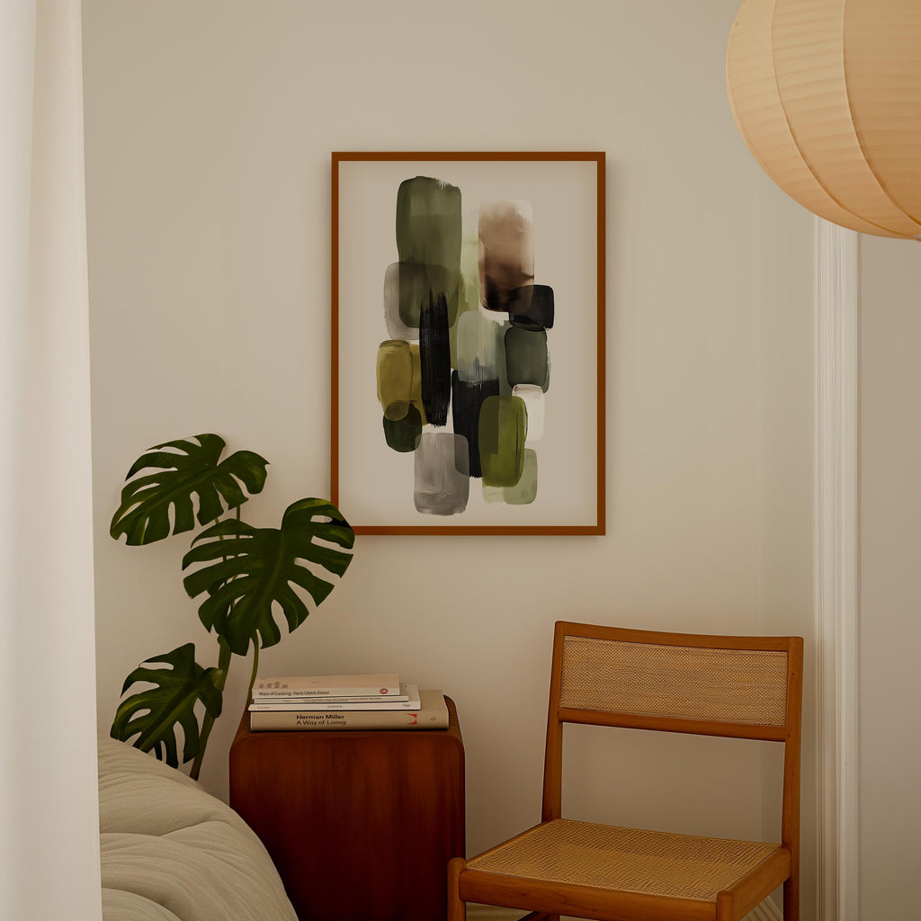 a cozy corner of a room with a wooden chair, a wooden side table, and a framed abstract painting hanging on the wall.