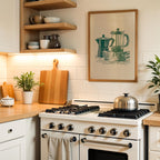 a cozy kitchen scene with a white gas range, wooden cutting board, and various kitchen accessories such as a coffee maker and a plant.