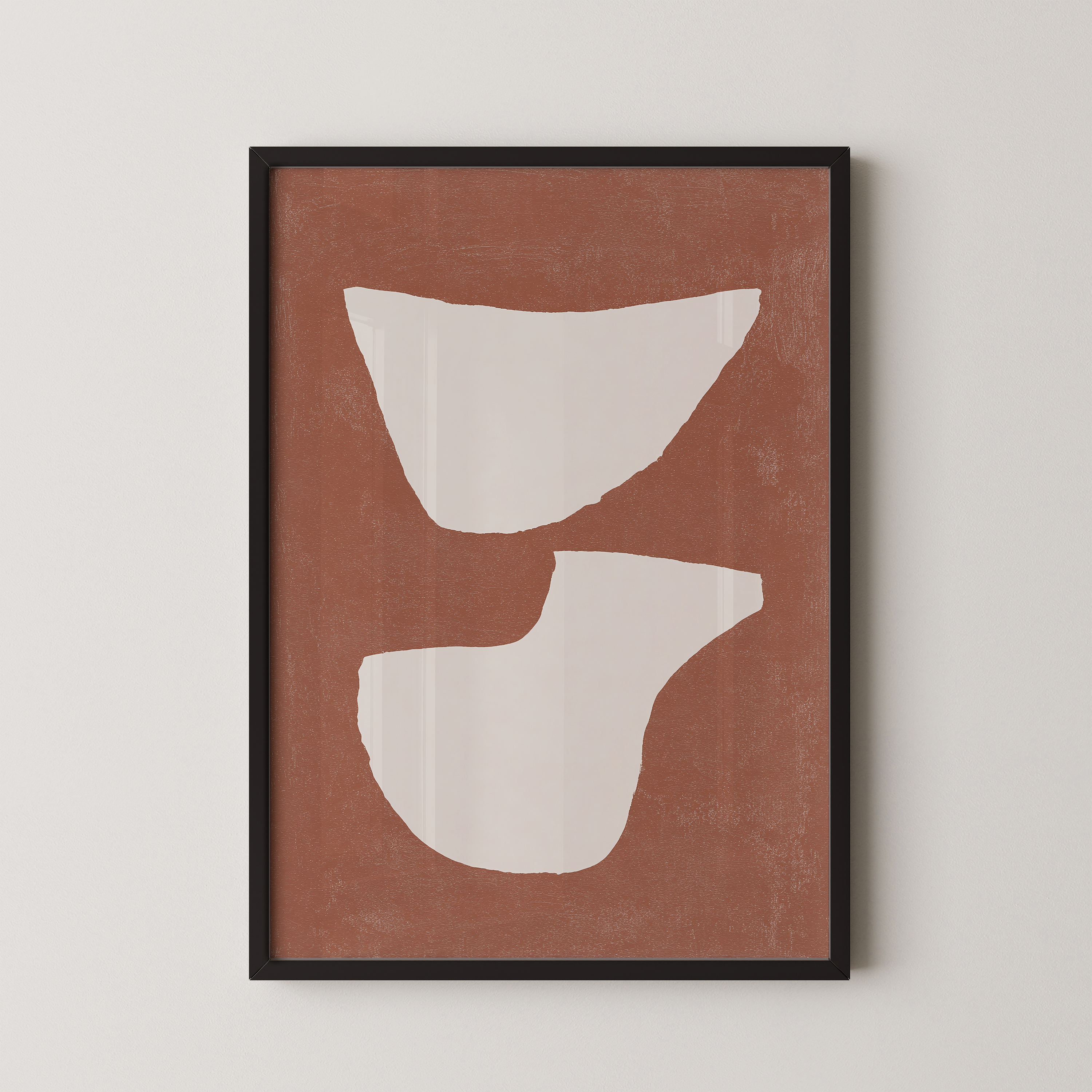The image is a framed abstract art piece with a brown background and two white shapes, one larger and one smaller, creating a minimalist and modern design.