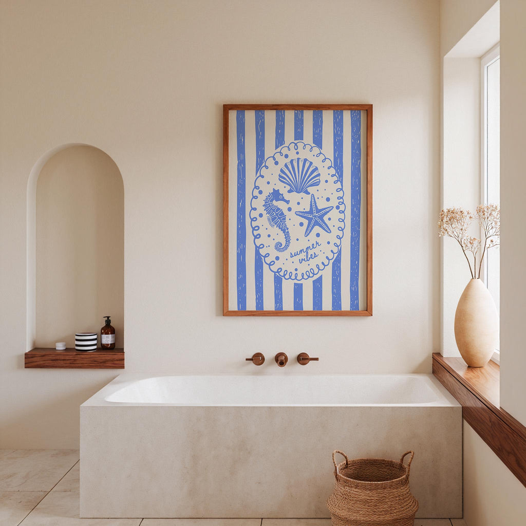a bathroom with a large framed picture of a seahorse and starfish on the wall above a white bathtub. The bathroom also features a wooden shelf, a vase with flowers, and a basket.