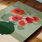 a vibrant illustration of a vase filled with red and pink flowers, set against a green background.