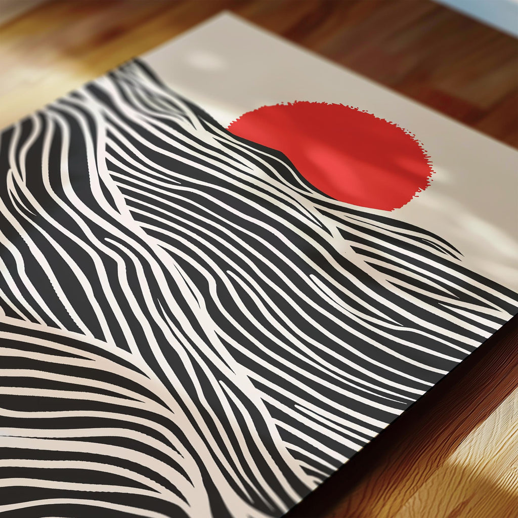 a striking abstract artwork with bold black and white stripes and a large red circle in the center.
