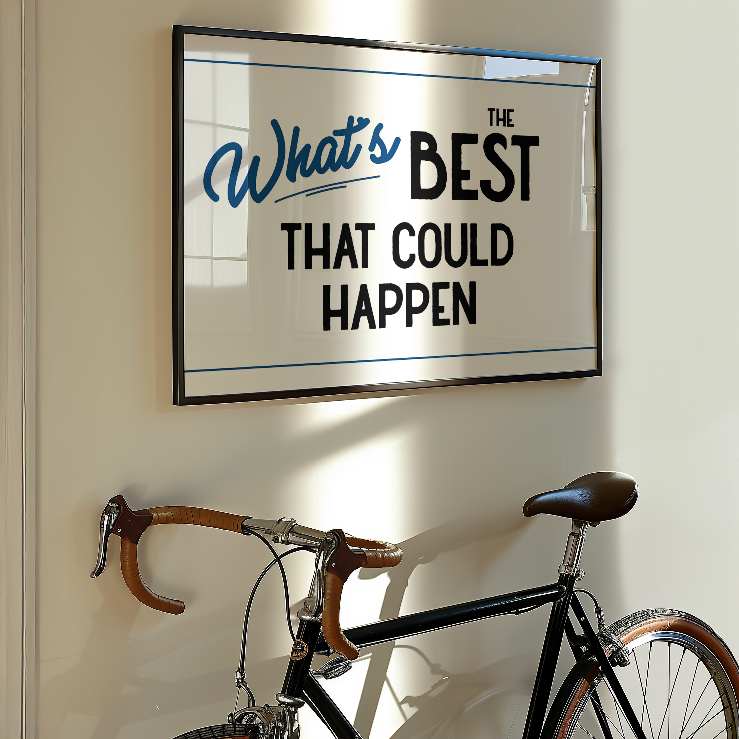 a framed motivational quote that says "What's best that could happen" on a wall, with a bicycle leaning against the wall below it.