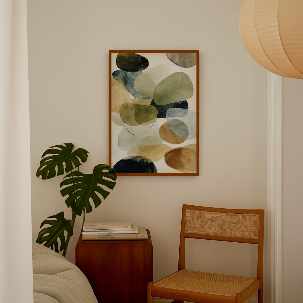 a cozy corner of a room with a wooden chair, a wooden side table, and a framed abstract painting hanging on the wall.