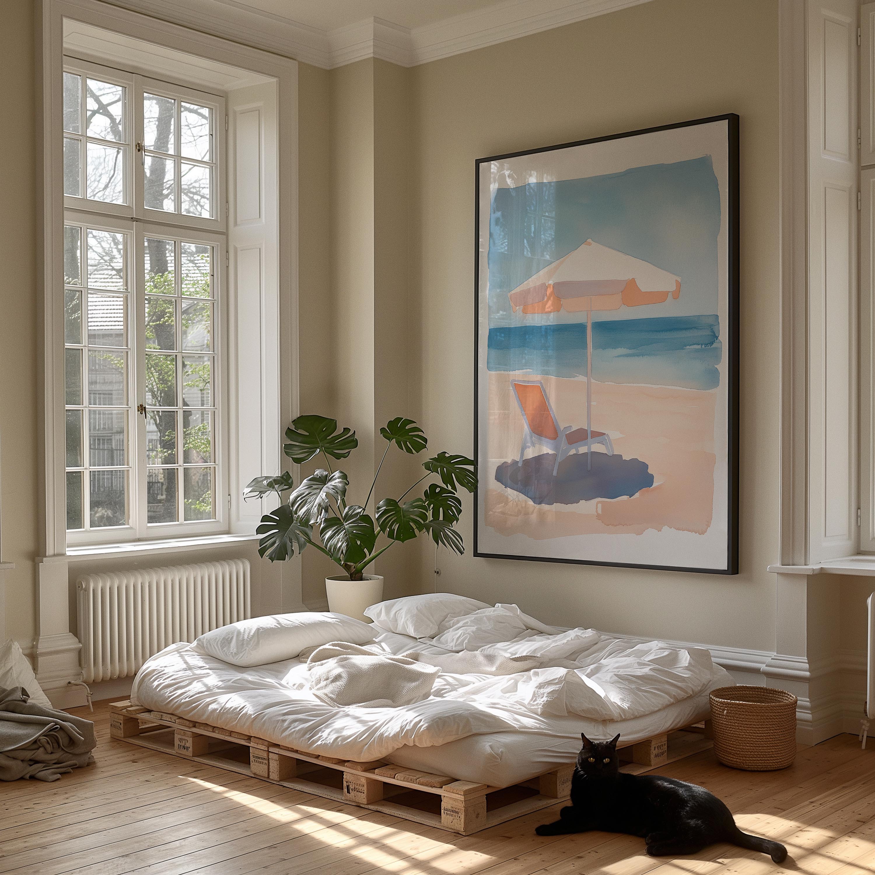 A cozy bedroom with a large window overlooking a beach, featuring a bed with white sheets, a potted plant, and a framed beach scene on the wall.