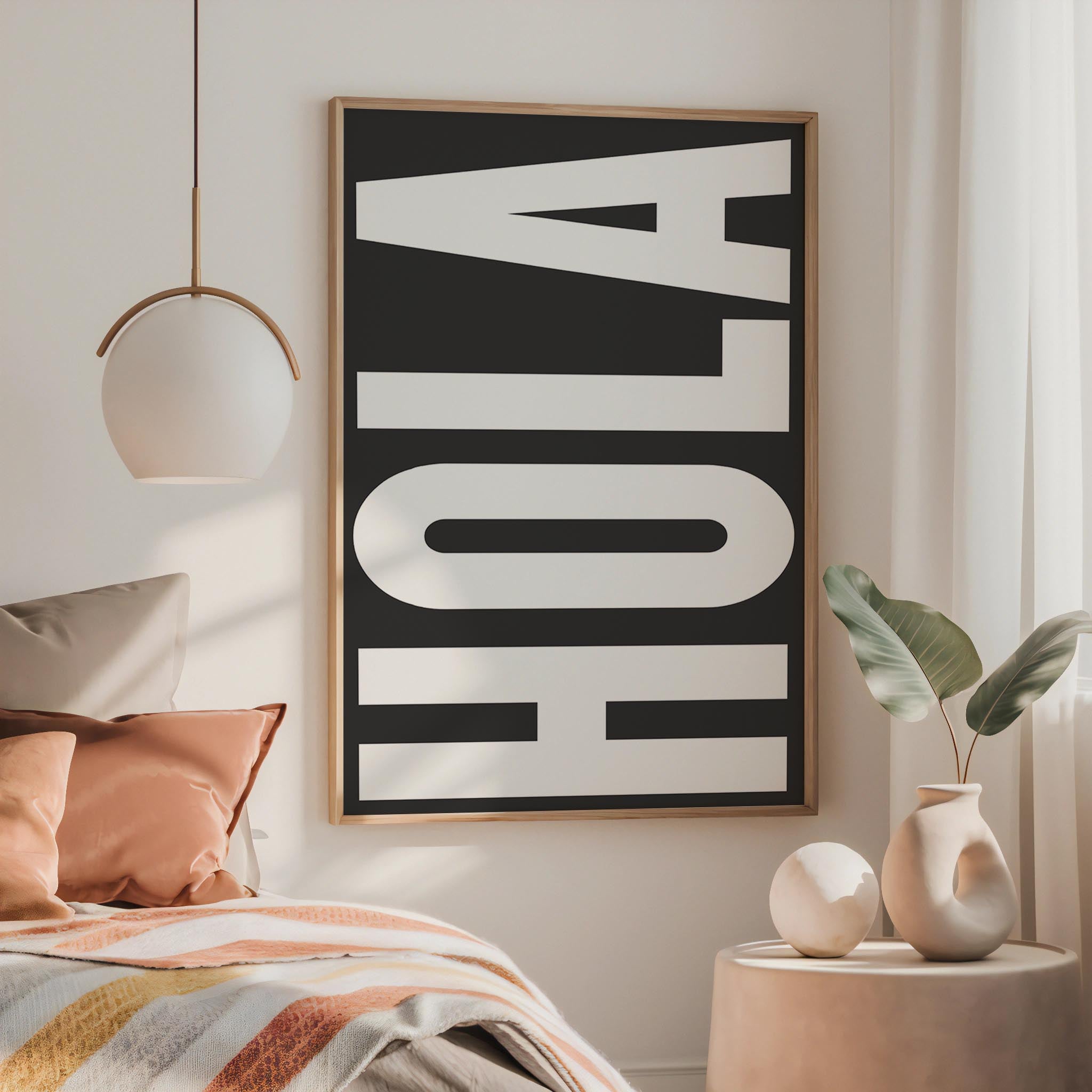 a bedroom with a bed, a framed sign, and decorative elements such as a potted plant and a vase.