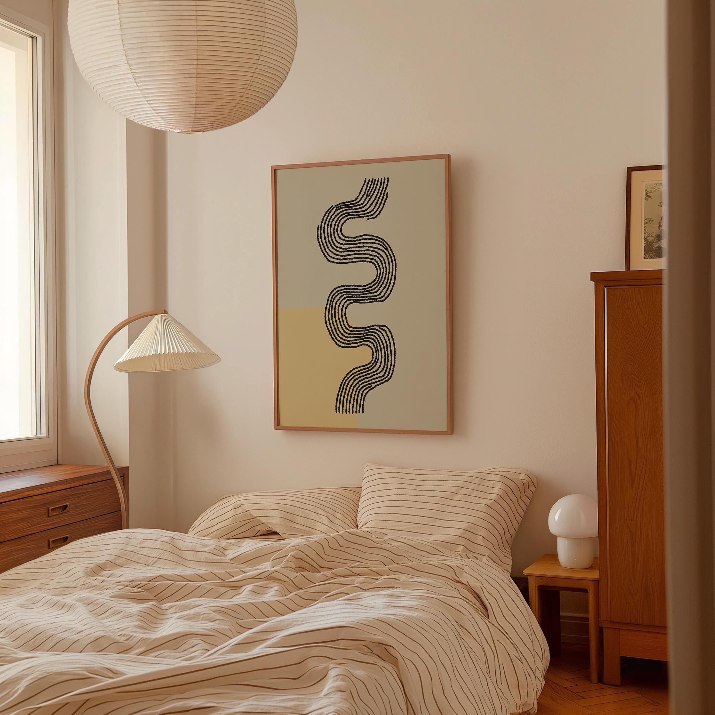 a cozy bedroom with a large bed, a lamp, and a framed abstract artwork on the wall.