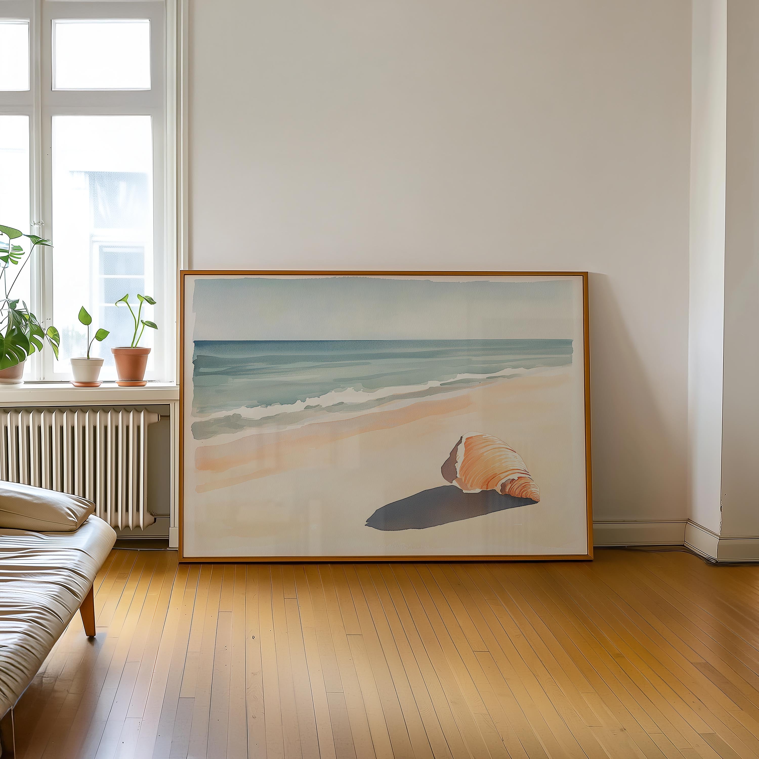 a large framed painting depicting a beach scene with a shell on the sand.