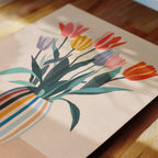 A colorful illustration of a vase filled with vibrant tulips on a wooden surface.
