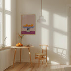 a cozy corner of a room with a wooden table, a vase of flowers, and a bowl of fruit. A wooden chair is positioned next to the table, and a painting of fruit adorns the wall above it. The room has a warm, inviting atmosphere with natural light streaming in from a window.