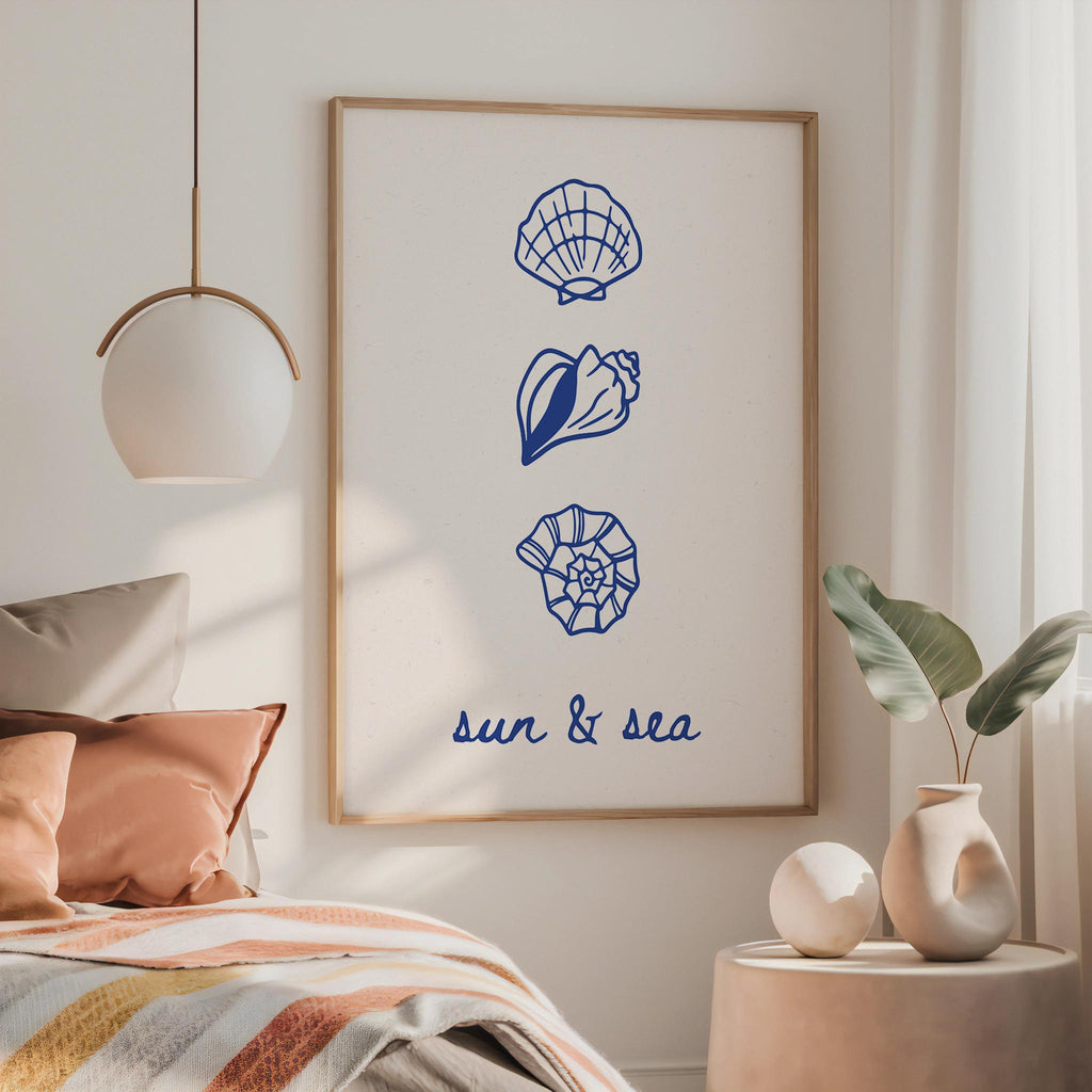 a bedroom with a bed, a framed poster with illustrations of seashells, and a potted plant on a side table.