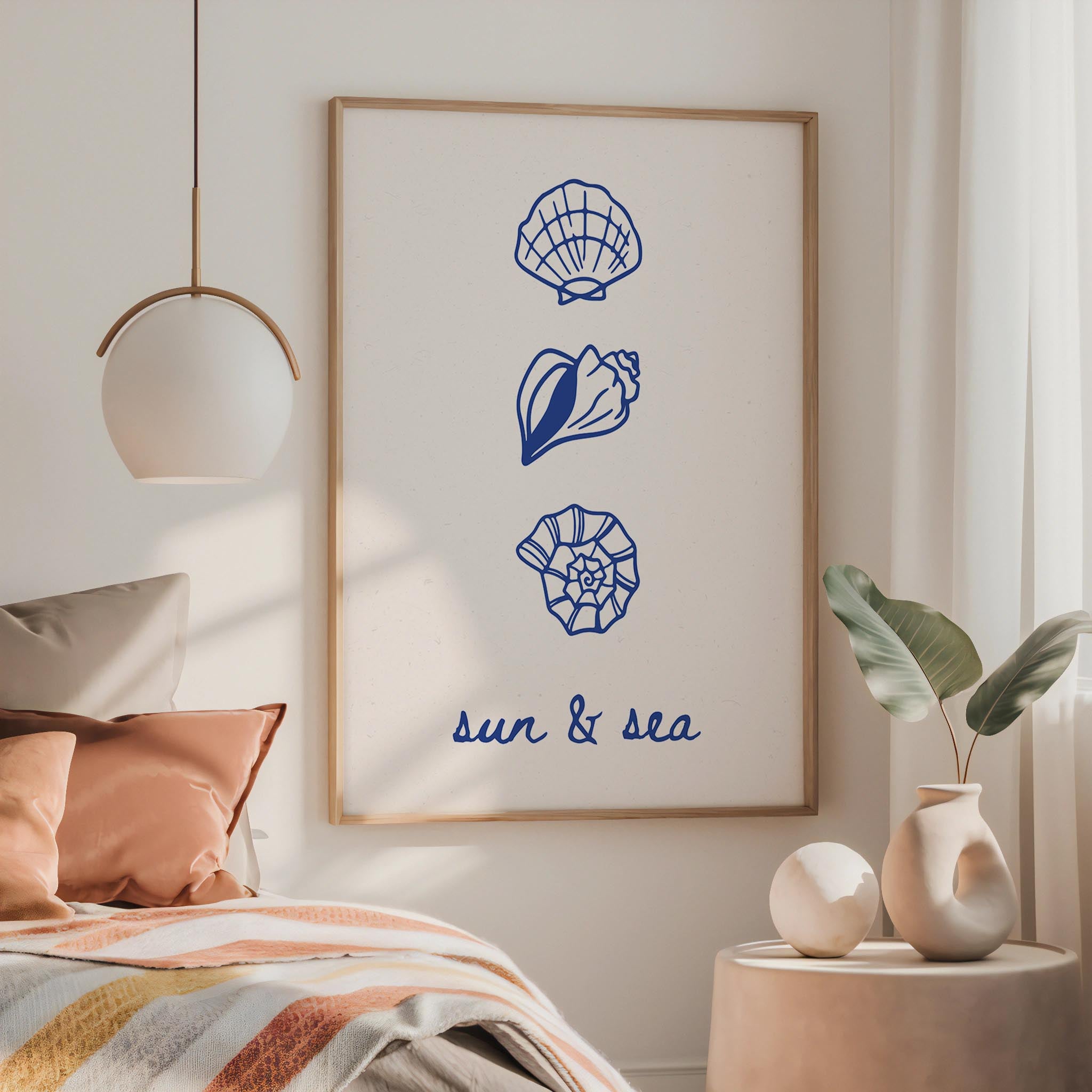 a bedroom with a bed, a framed poster with illustrations of seashells, and a potted plant on a side table.