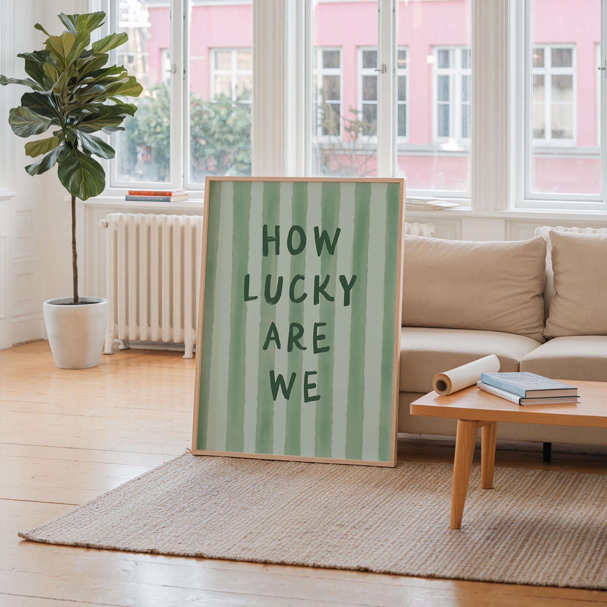 a large green and white striped sign with the text "HOW LUCKY ARE WE" displayed prominently in the center of the room.