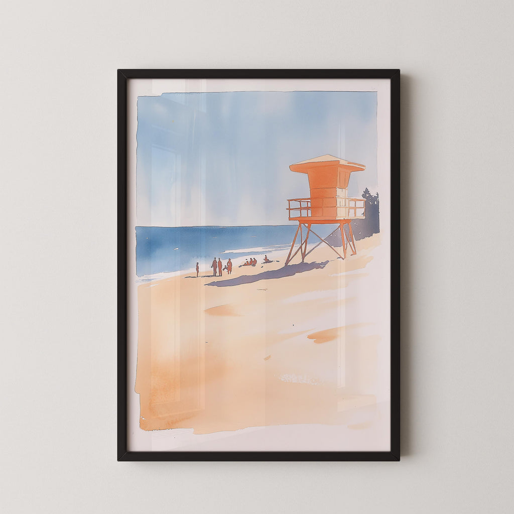 A framed watercolor painting depicting a lifeguard tower on a beach with people enjoying the ocean.