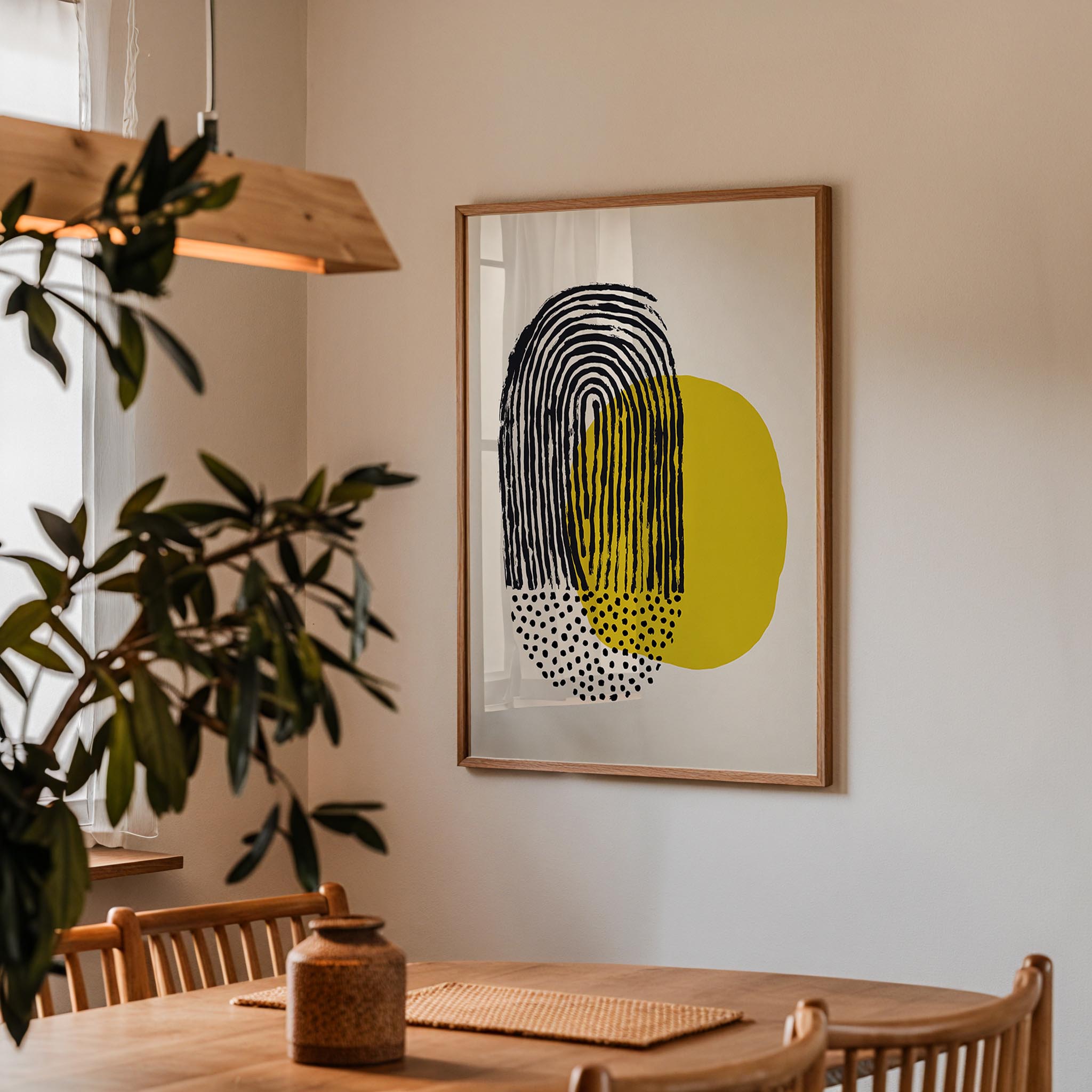 a modern dining room with a wooden table and chairs, a potted plant, and a framed abstract art piece hanging on the wall.