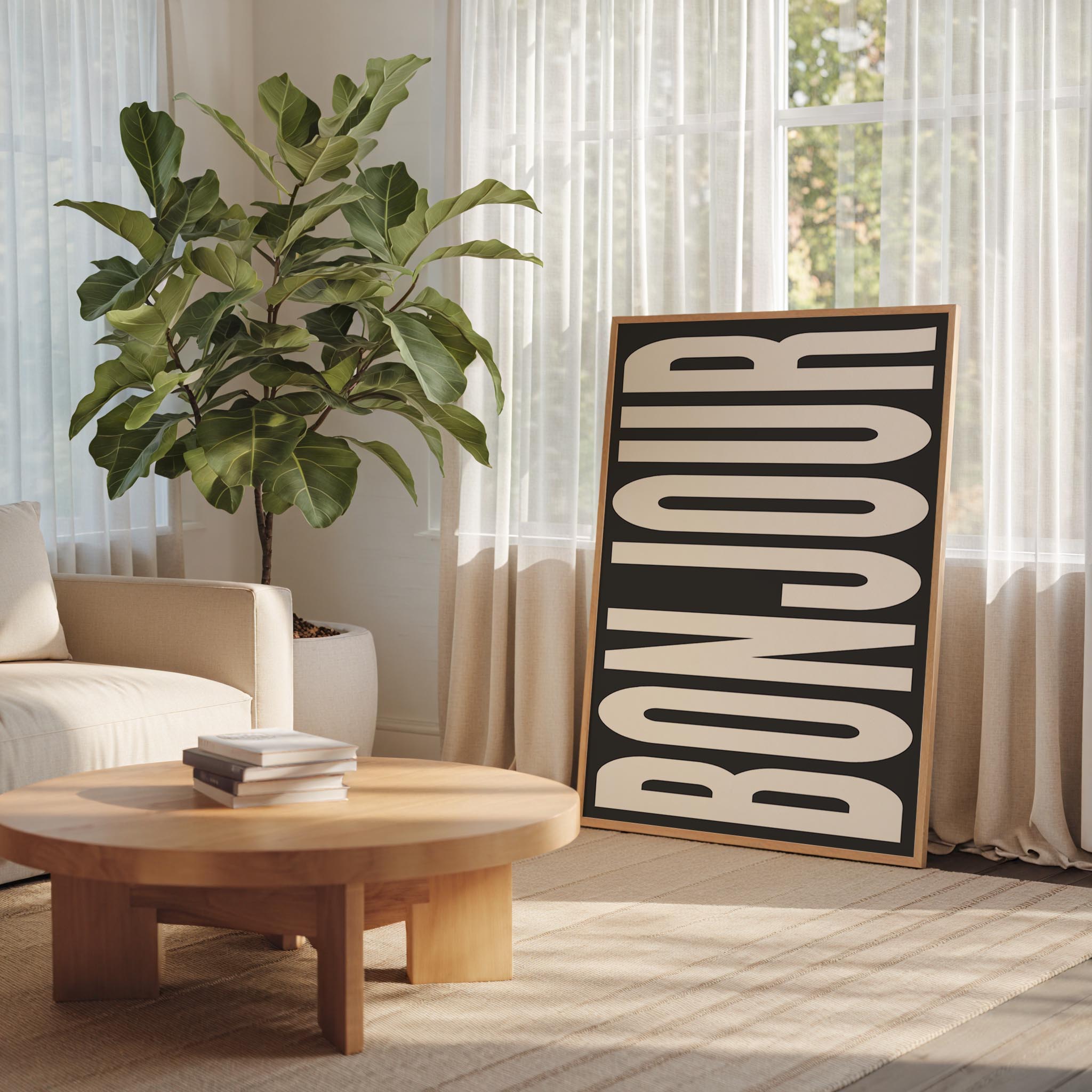 a living room with a large potted plant, a wooden coffee table, and a framed sign with the word "BONJOUR" written on it.