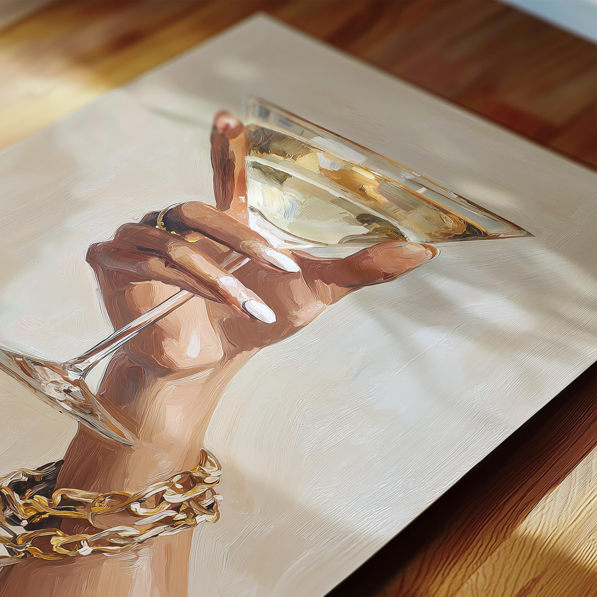 A hand holding a glass of wine or champagne, with a bracelet on the wrist.