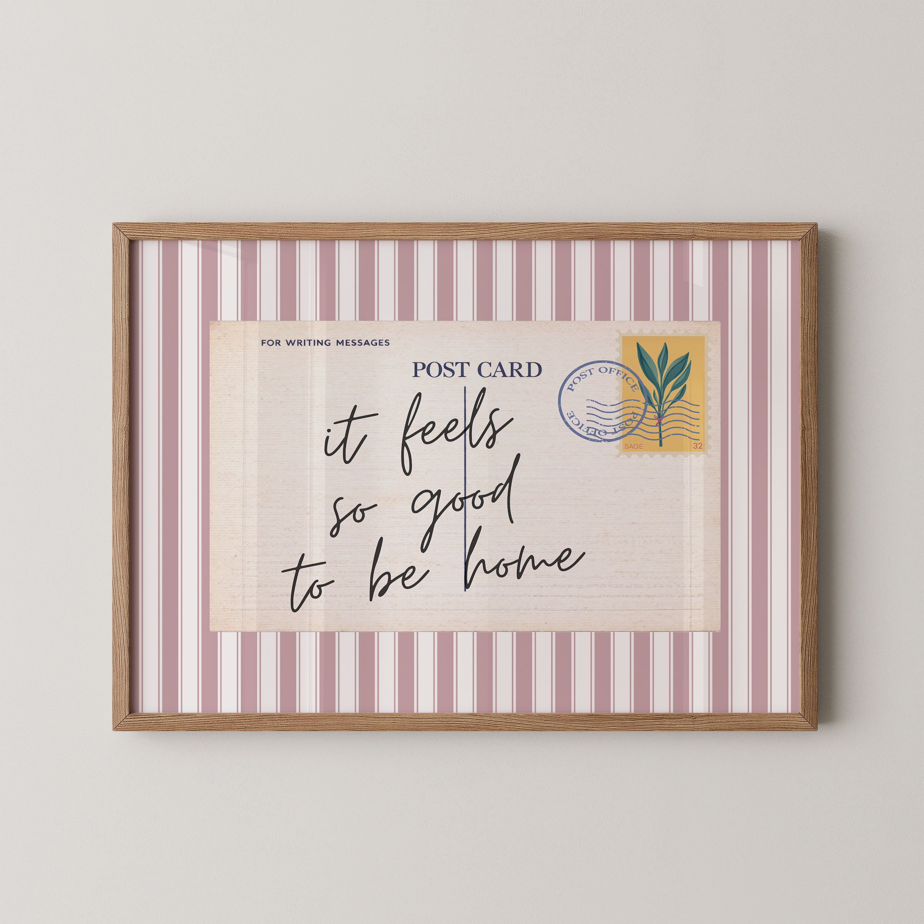 The image is a framed print with a postcard-like design, featuring a handwritten message that reads "it feels so good to be home".