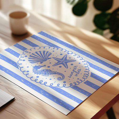 A blue and white striped placemat with a decorative design featuring a seashell, starfish, and a wave pattern.