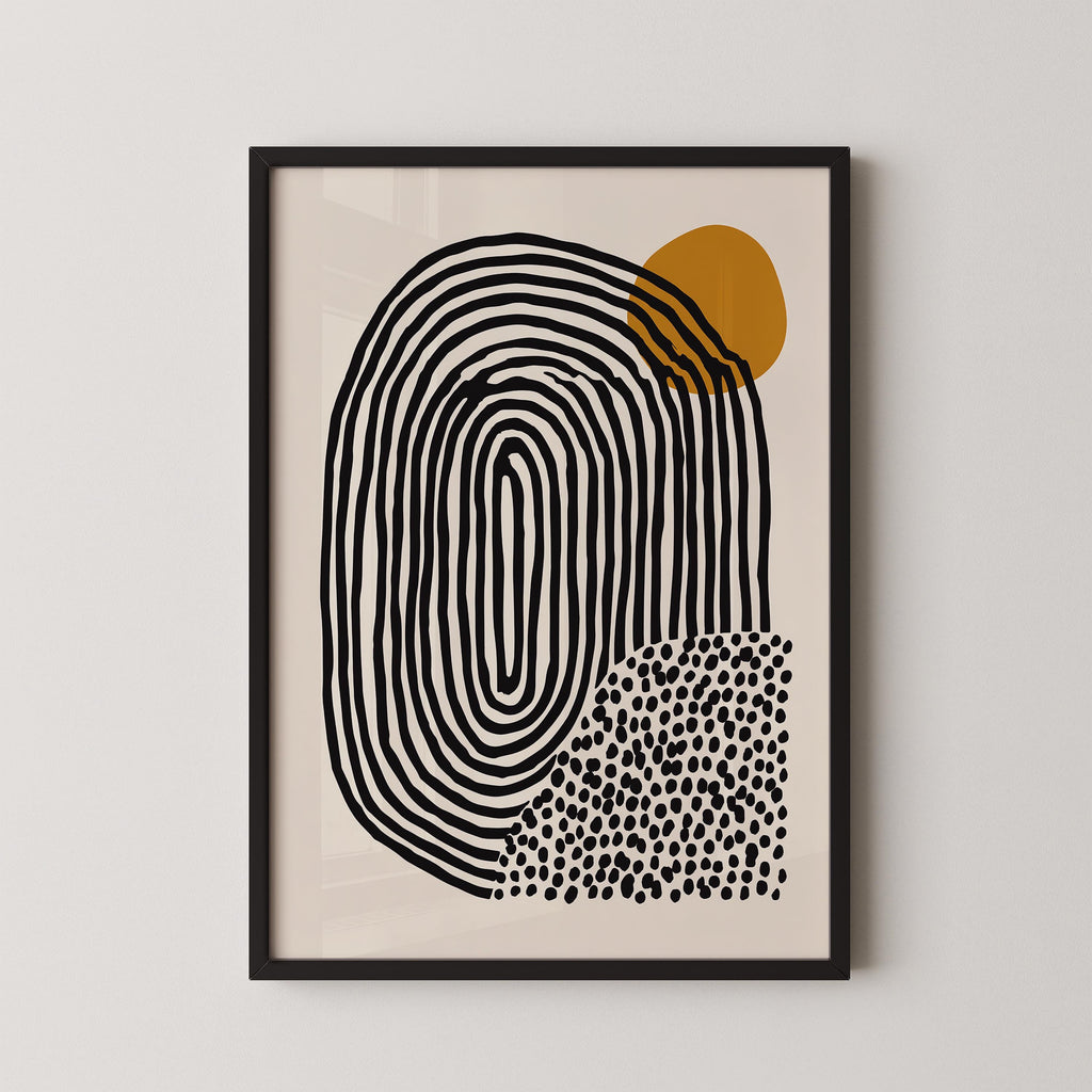 The image is a framed abstract art piece featuring a large black and white spiral design with a small orange circle above it.