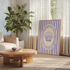 a cozy living room with a large potted plant, a wooden coffee table, and a framed picture with a shell design on the wall.