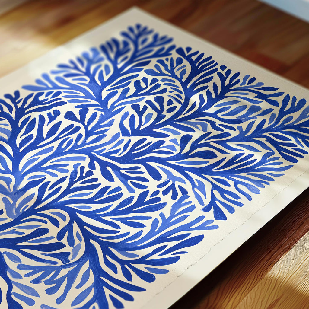 a close-up view of a piece of paper with a blue and white floral pattern.