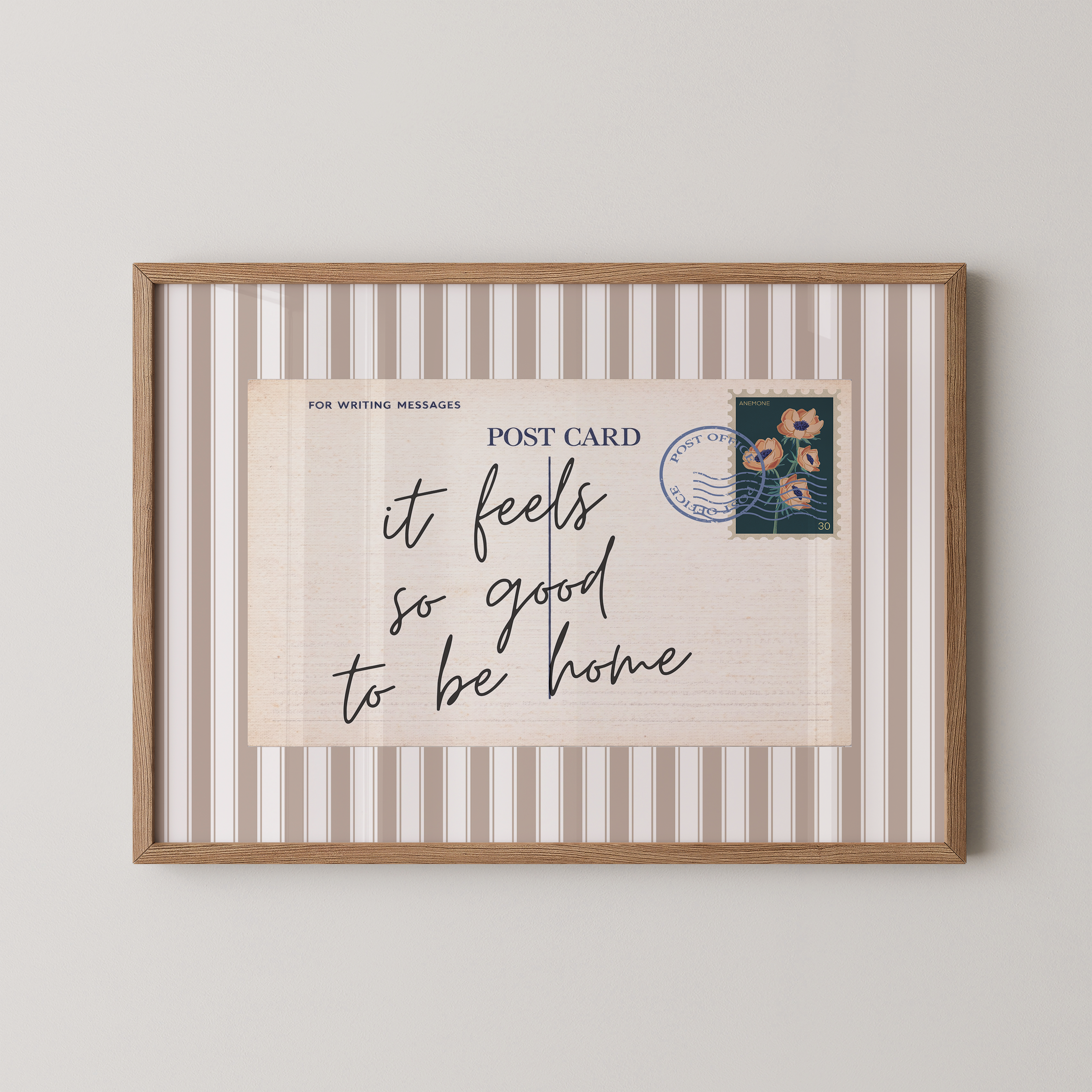 The image is a framed print with a postcard-like design, featuring a handwritten message and a postage stamp.