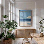 a serene and modern living space with a large window, a wooden cabinet, and a framed artwork of a beach scene.