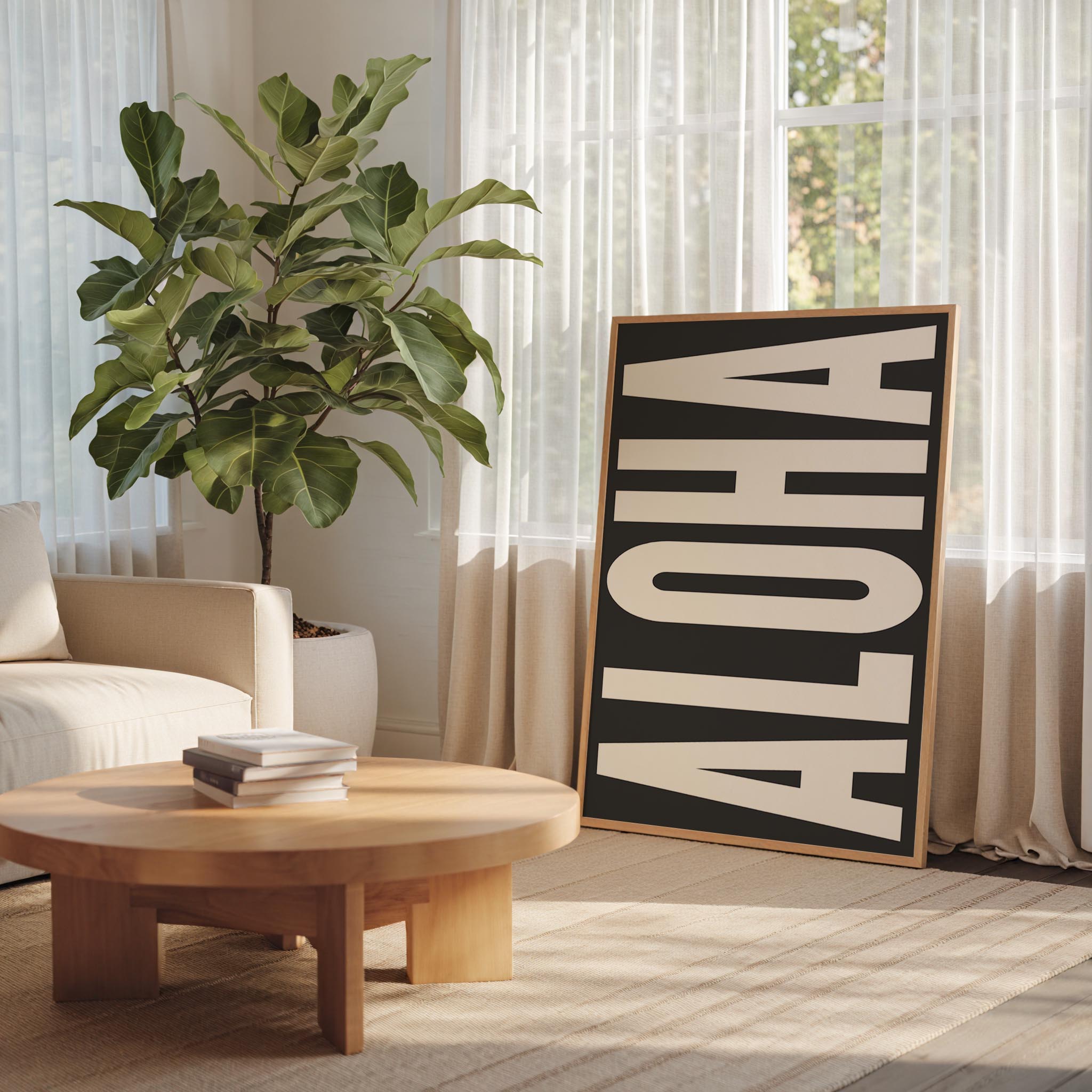 a living room with a large potted plant, a wooden coffee table, and a framed sign with the word "ALOHA" on it.