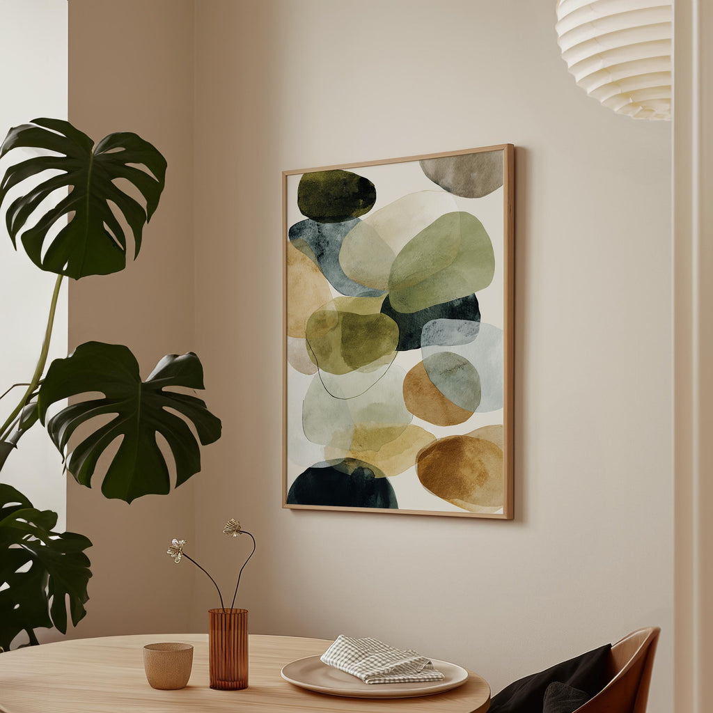 a minimalist dining area with a wooden table, a vase with flowers, and a framed abstract painting hanging on the wall.