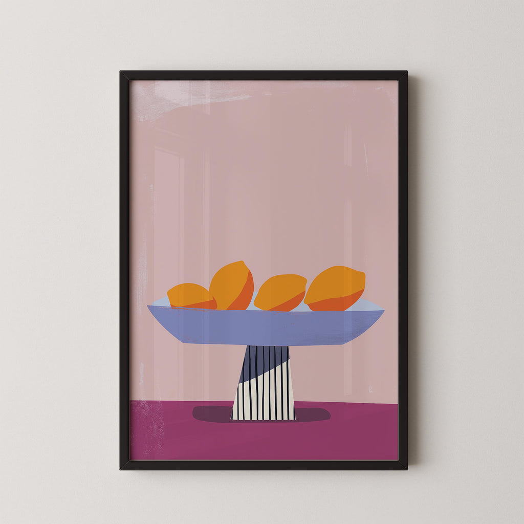 A framed illustration of a bowl containing three oranges on a pink background.