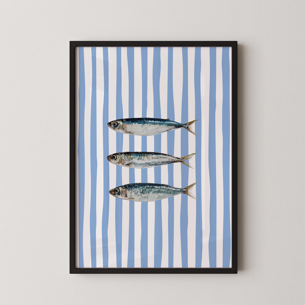 three fish swimming against a blue and white striped background.