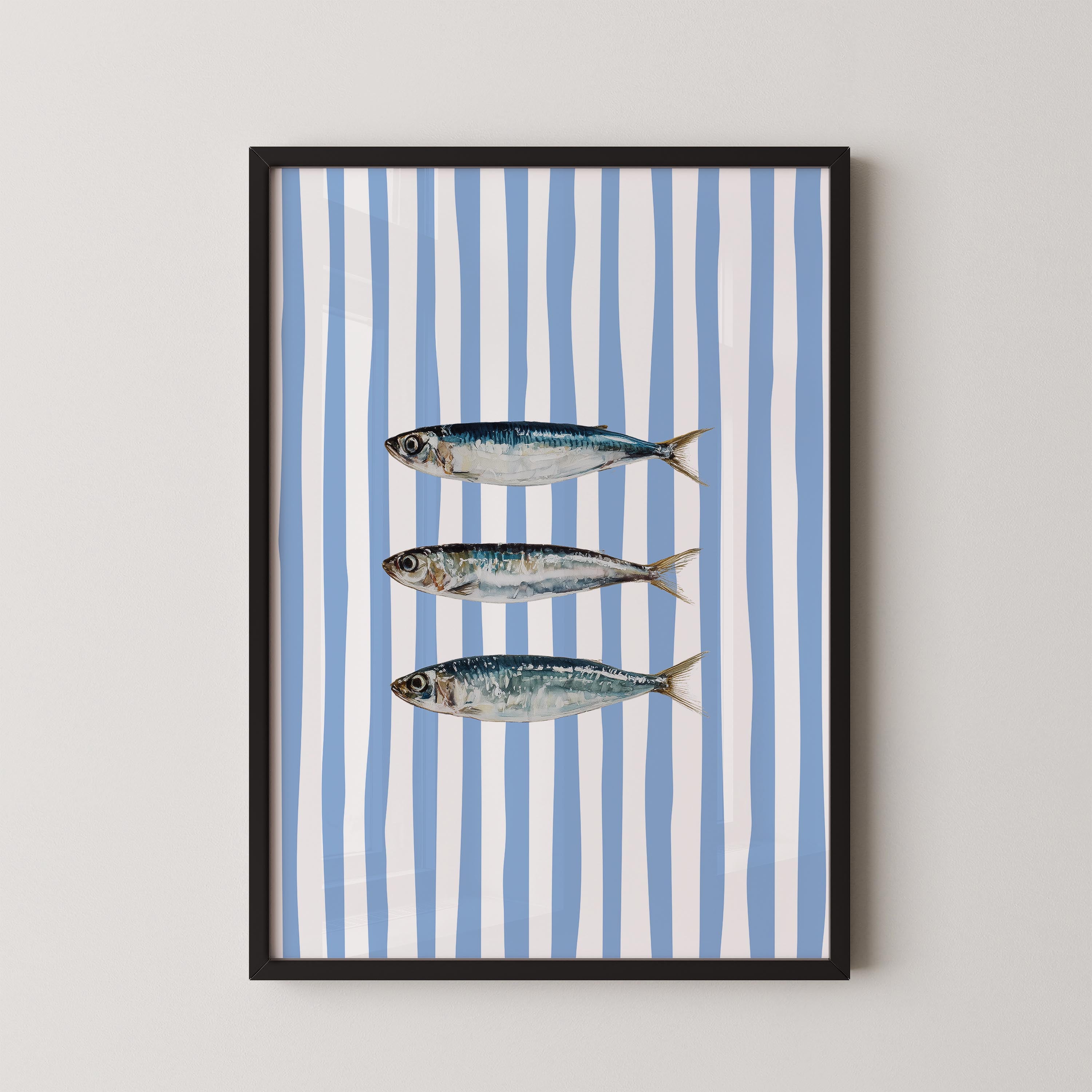 three fish swimming against a blue and white striped background.