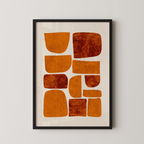The image is a framed abstract art piece featuring a geometric design composed of various shapes and sizes, including circles, rectangles, and triangles, all rendered in a warm, earthy color palette.