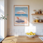 a kitchen counter with a bowl of lemons, a framed painting of a beach scene, and a shelf with jars and containers.
